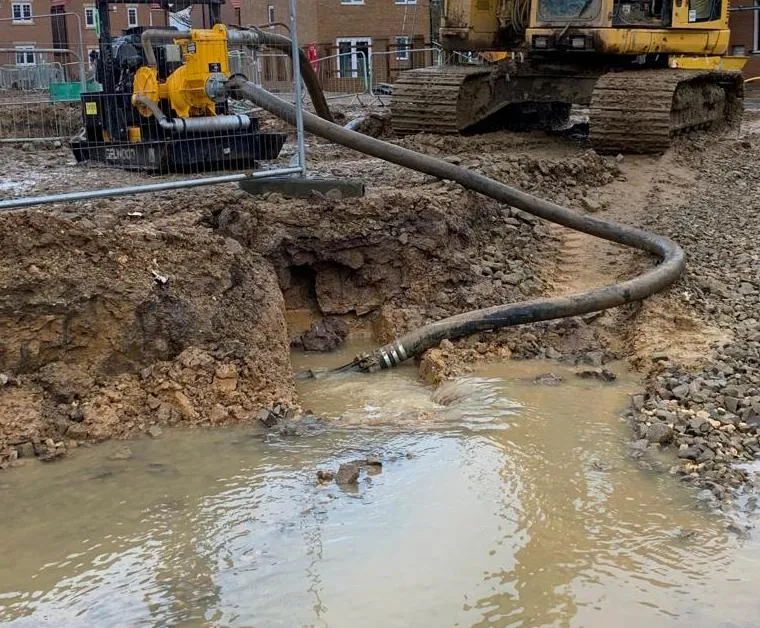 Core Groundworks team hard at work clearing a drain issue